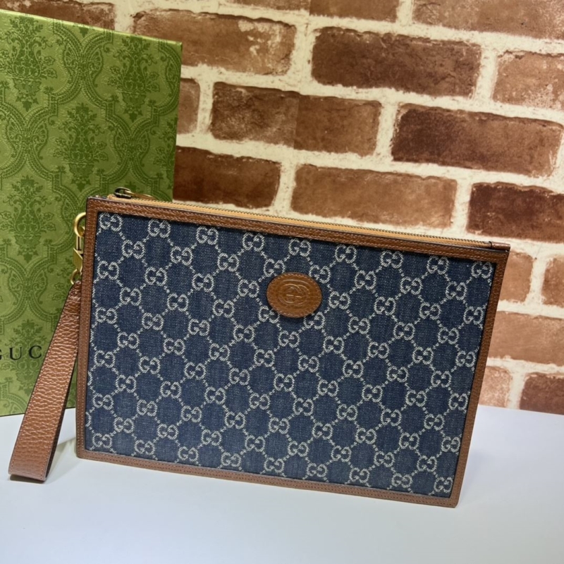 G*u*i clutch bags